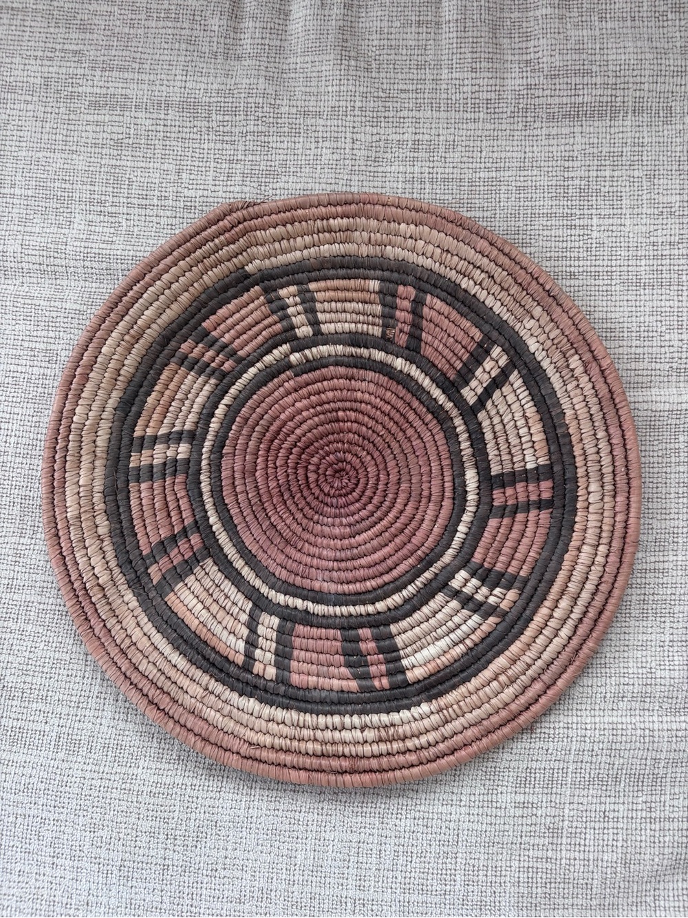 vintage handwoven coiled basket tray wall decor mauve geometric boho